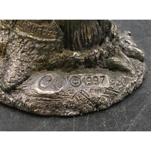 215 - A modern Comyns silver mounted figure of a squirrel (filled), 8.2cm high