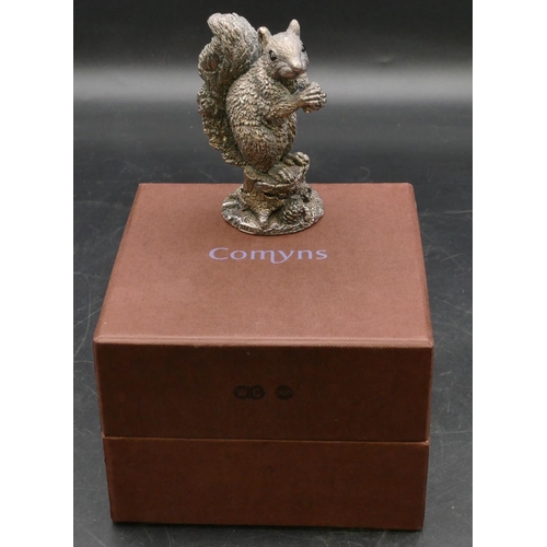 215 - A modern Comyns silver mounted figure of a squirrel (filled), 8.2cm high