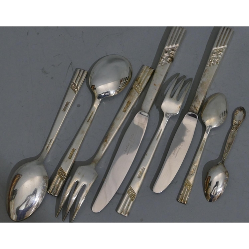 229 - An Arden silver plated 6-place setting flatware service with raised floral and reeded handles, boxed... 