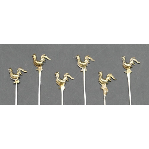 237 - A set of 6 Continental silver gilt coloured metal cocktail sticks with cockerel motifs, in fitted br... 