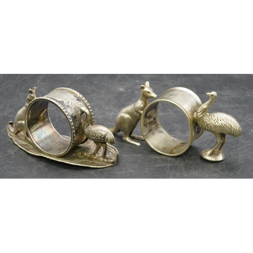 238 - An Australian Stewart Dawson & Co. silver plated napkin ring supported by kangaroo and emu, 11.5m wi... 