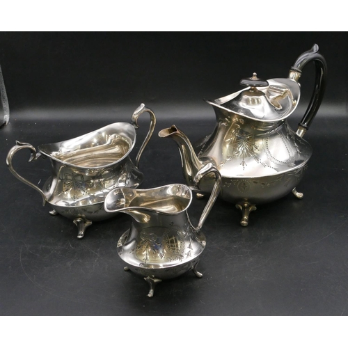 243 - A silver plated oval bulbous shaped tea service on splayed feet with engraved ribbon and swag decora... 