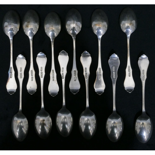 257 - A set of 12 Sheffield silver teaspoons with engraved floral and leaf handles, maker's mark K. & P., ... 