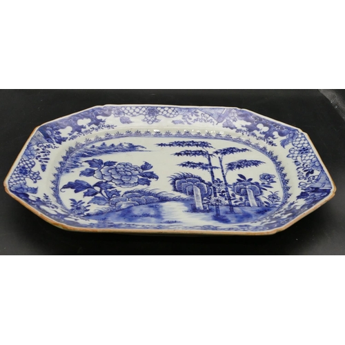 26 - An 18th Century Chinese rectangular meat plate on blue and white ground with bamboo, river, landscap... 