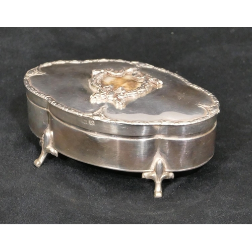 273 - A Birmingham silver oval trinket box with hinged, scallop shaped top with raised swag and ribbon dec... 