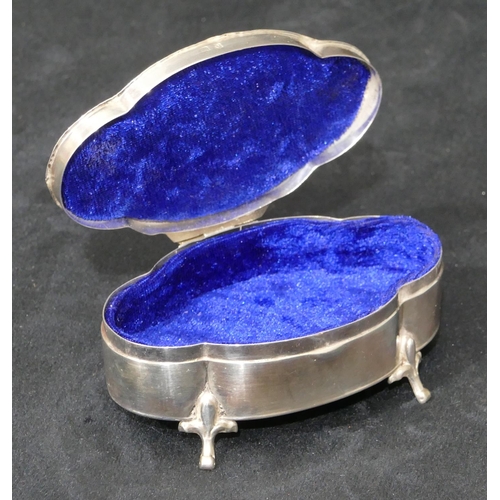 273 - A Birmingham silver oval trinket box with hinged, scallop shaped top with raised swag and ribbon dec... 