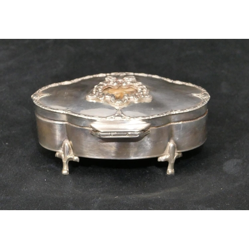 273 - A Birmingham silver oval trinket box with hinged, scallop shaped top with raised swag and ribbon dec... 