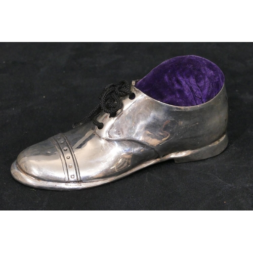 277 - A George V silver novelty pin cushion in the form of a shoe, 12.5cm long, Chester 1923