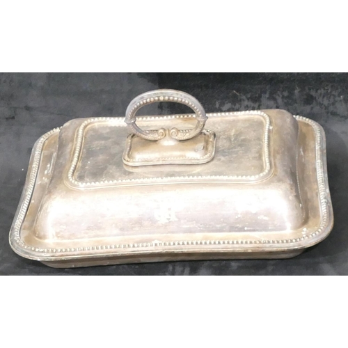 282 - A silver plated rectangular shaped entree dish with cover, raised ball rim, 28.5cm wide, a quantity ... 