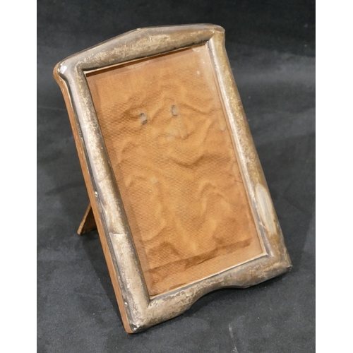 283 - A Birmingham silver mounted free-standing photograph frame, 16.5cm high