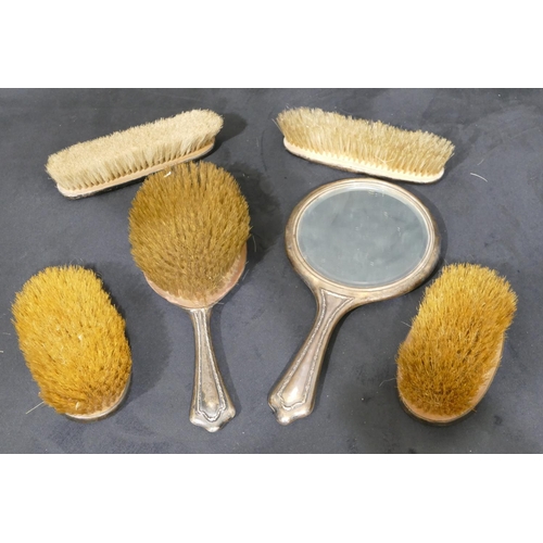 284 - A 4-piece Sheffield silver mounted dressing table set, hand mirror and 3 brushes, a pair of London s... 