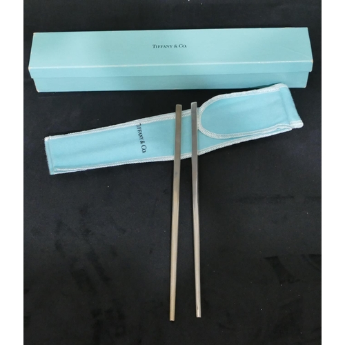 292 - A pair of modern Tiffany & Co. sterling silver chopsticks, boxed, 1.5oz