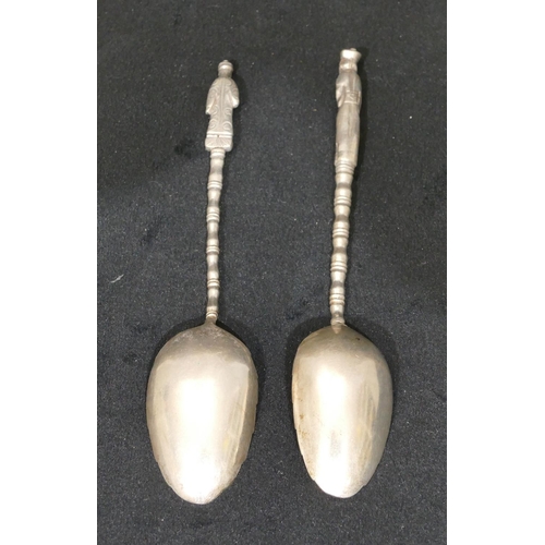 297 - 2 Chinese silver coloured metal teaspoons, with figure motifs, bamboo shaped stems, 0.7oz (2)