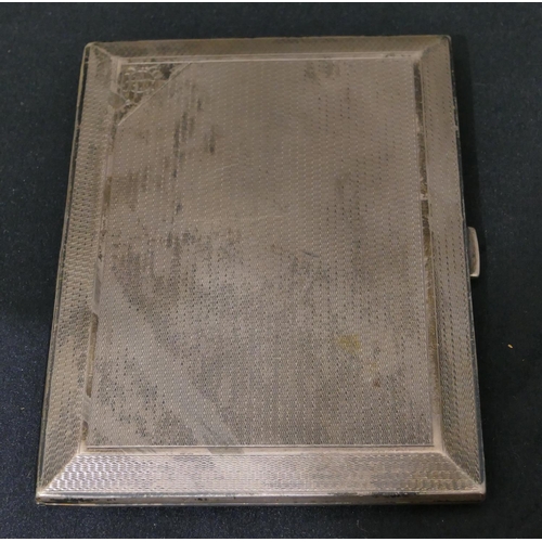 307 - A Birmingham silver cigarette case with allover engine turned decoration, hinged front, 11.5cm, 5.5o... 