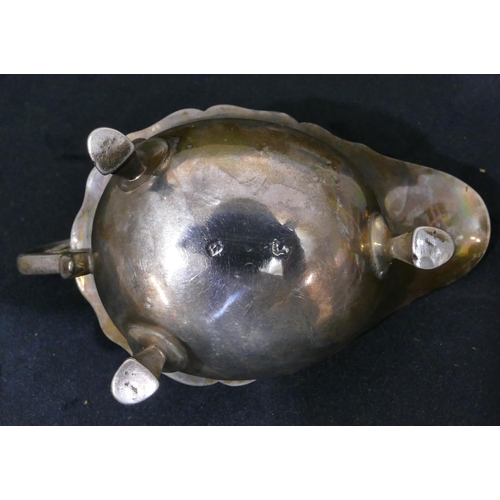 309 - A Georgian silver small sauce boat with crinkle rim, scroll handle, on hoof feet, 12cm long, 3.2oz (... 