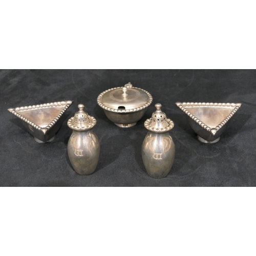 315 - A 5-piece Scottish silver condiment set with ball rims, a pair of triangular shaped salts, a pair of... 