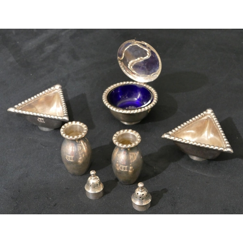 315 - A 5-piece Scottish silver condiment set with ball rims, a pair of triangular shaped salts, a pair of... 