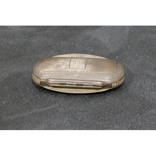 319 - A silver coloured metal double hinged oblong pill box with engraved decoration, 4.6cm wide, 0.4oz