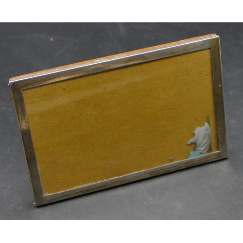 328 - A late 19th Century silver plain freestanding photograph frame with oak back, Birmingham 1898, maker... 