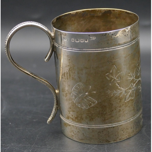 343 - A Victorian Sheffield silver christening mug with engraved decoration, scroll handle, 8cm high, 3.2o... 