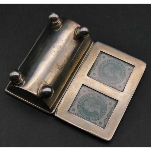 345 - A 925 silver trough shaped double stamp box with hinged lid, ball feet, 5.5cm wide, 1oz.