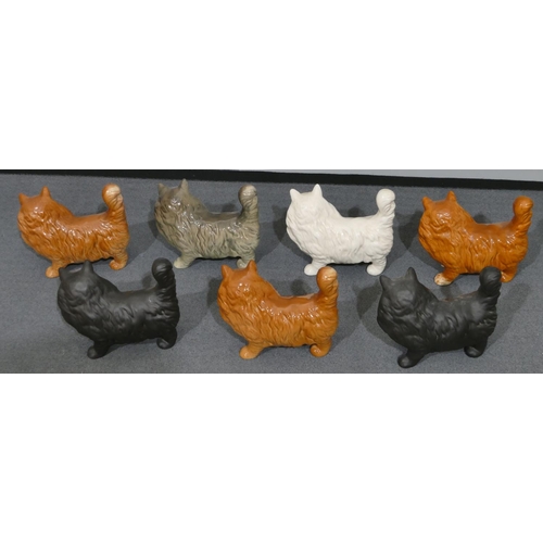 35 - 7 various coloured Beswick figures of cats, 12.5cm high