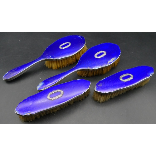 353 - A 4 piece sterling silver and blue enamelled dressing table set, 4 brushes (all pieces in need of re... 