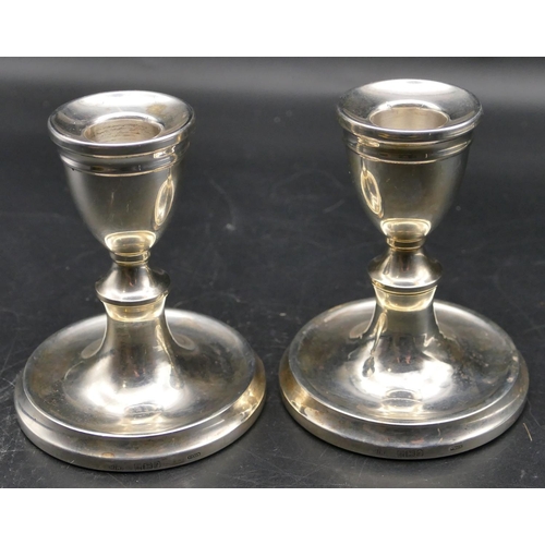 361 - A pair of modern Birmingham silver dwarf candlesticks with turned stems and round sweeping bases, ma... 