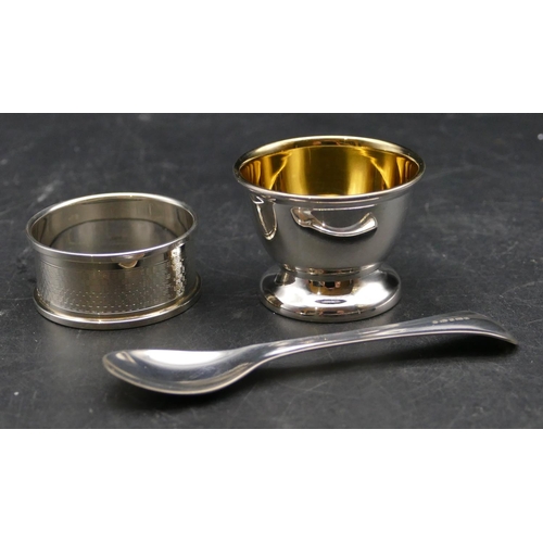 375 - A modern London 925 silver egg cup and matching spoon, a Birmingham silver napkin ring, 1.5oz