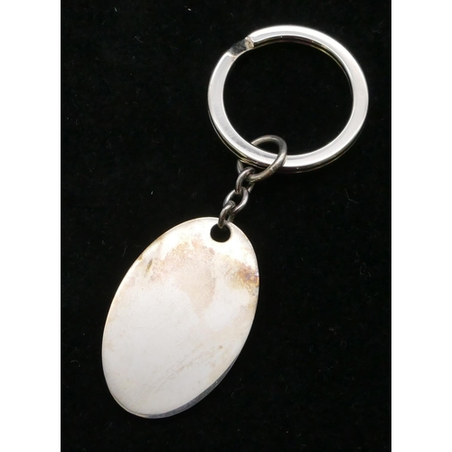 383 - A modern Birmingham plain silver oval keyring