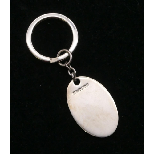 383 - A modern Birmingham plain silver oval keyring