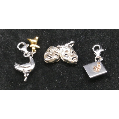 385 - 3 modern silver small charms