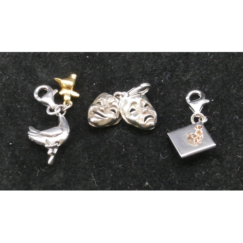 385 - 3 modern silver small charms