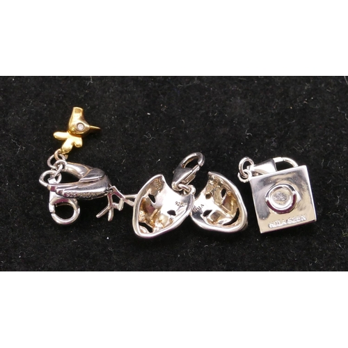 385 - 3 modern silver small charms