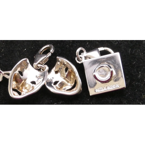 385 - 3 modern silver small charms