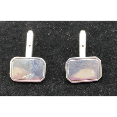 395 - A pair of modern silver plain rectangular shaped gentleman's cufflinks, boxed.