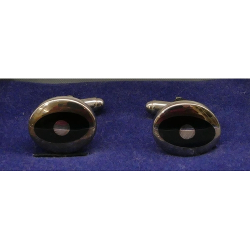 397 - A modern silver oval gentleman's cufflinks with black inset, boxed.