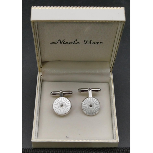 398 - A pair of modern silver circular gentleman's cufflinks, boxed.