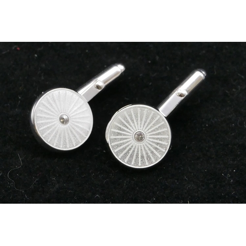 398 - A pair of modern silver circular gentleman's cufflinks, boxed.