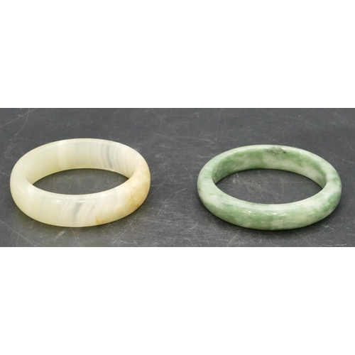 400 - 2 green hardstone bangles.