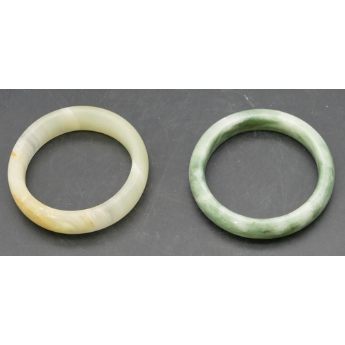 400 - 2 green hardstone bangles.