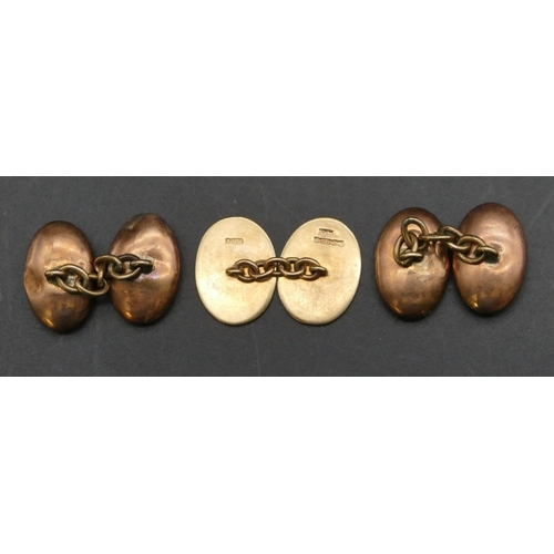 405 - A pair of gentleman's hollow oval cufflinks with engraved initials, a 9ct gold single cufflink, 11.3... 