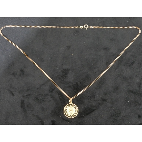 427 - A 9ct gold flat linked chain, 51cm long with circular drop pendant, 6.2 grams