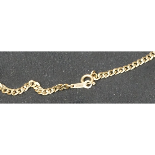 428 - A 9ct gold flat linked chain, 52cm long, 8.2 grams