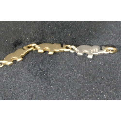 429 - A 14ct 2-coloured gold bracelet in the form of a train of elephants, 20cm long, 7.1 grams