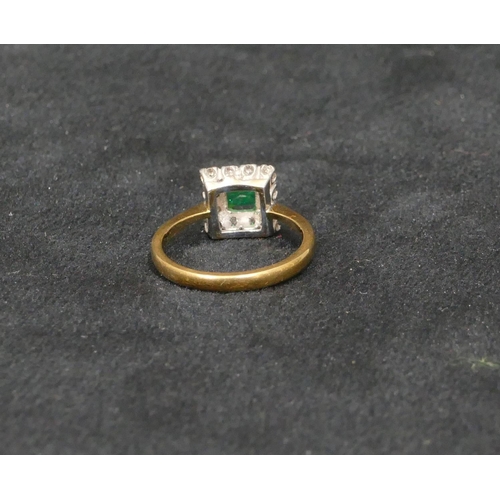 448 - A high carat gold ladies square cluster ring set with centre green stone surrounded by 12 diamonds, ... 