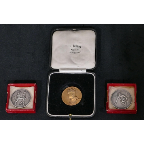 449 - A 1937 Coronation medallion, George VI, 2 other cricketing and athletics medals (3)