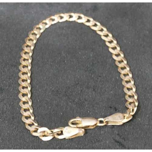 454 - A silver and gold covered hinged bangle, a small silver flat linked chain, a watch chain and a gentl... 