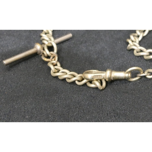 454 - A silver and gold covered hinged bangle, a small silver flat linked chain, a watch chain and a gentl... 