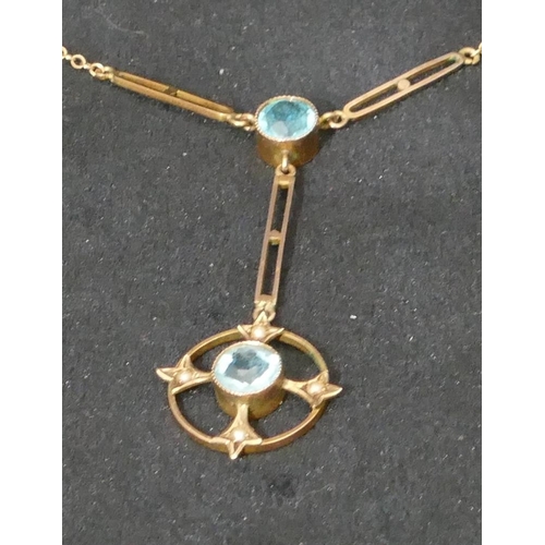 459 - A 9ct gold aquamarine style drop pendant mounted with small half pearls with chain